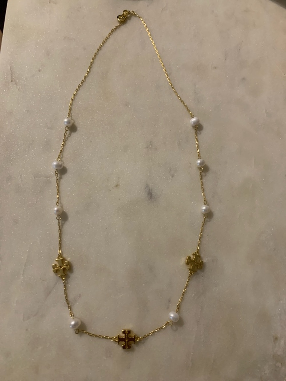 Tory Burch Gold-Tone Necklace with White Pearl Stations and Logo Motifs